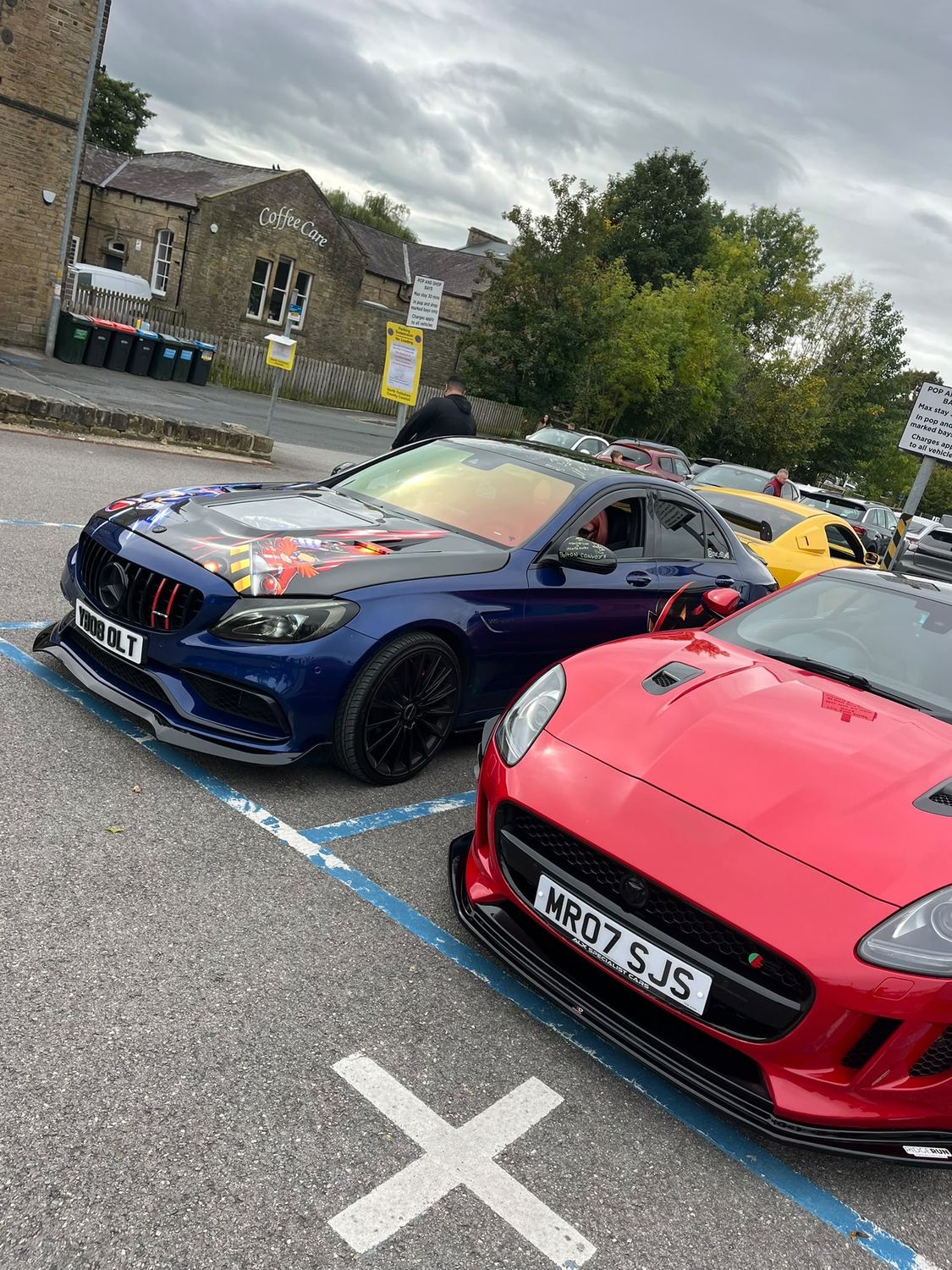 Mercedes-AMG and red Jaguar F-Type